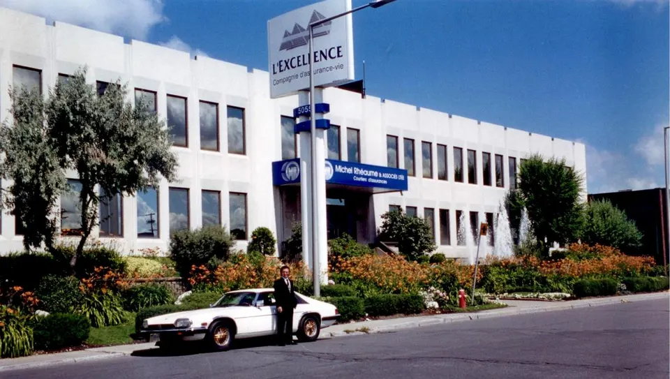 Michel Rhéaume Sr. outside the L’Excellence head office, its signage also carrying the name Michel Rhéaume & Associés ltée